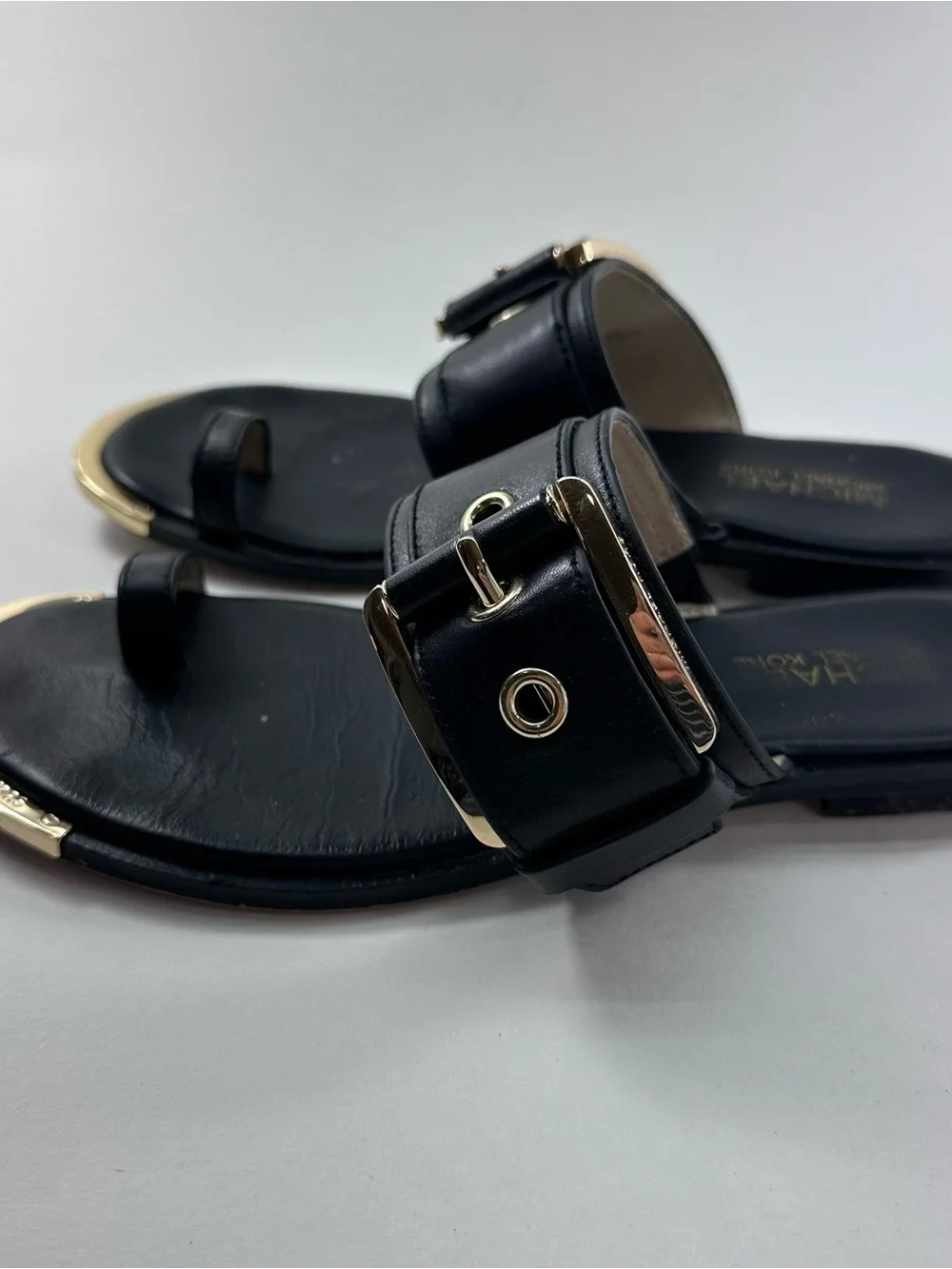 MICHAEL Michael Kors Black Leather Buckle Toe-Ring Slides with Gold Trim